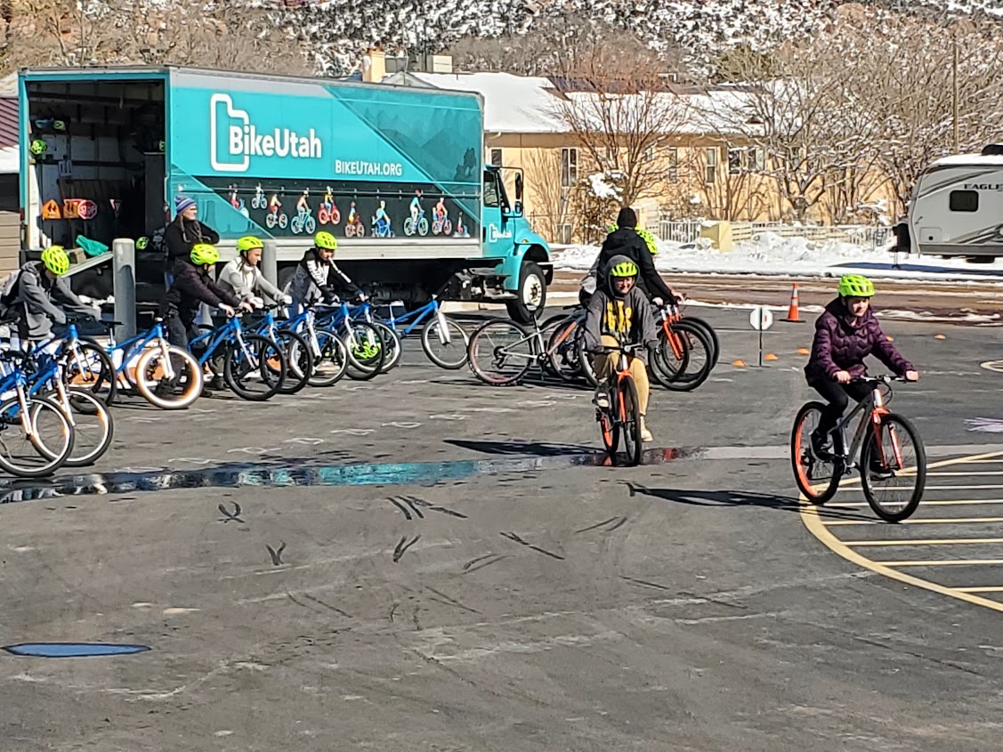 Students riding bicycles at the Bike Utah event at Water Canyon Elementary.